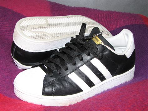 adidas with stripes only on one side|adidas one sided shoes.